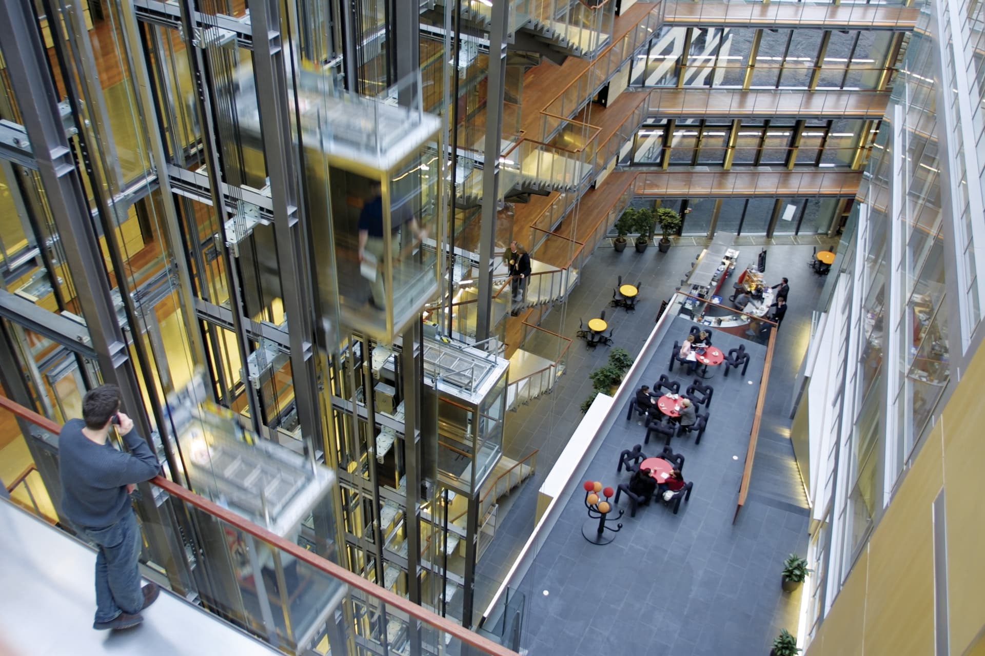 people watching, atrium, elevator, glass, skybridge, mobile phone, gathering, corridor